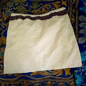 NWOT Tory Burch string pull dust bag 14 x 13 “w/ Tory pull charm